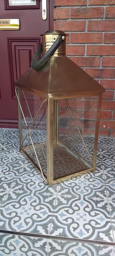 Large brass lantern with strap handle