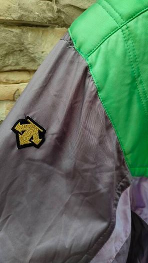 Vintage Descente 1980s ski jacket Official supplier of the Suisse ski team This is a rare and unique piece The quality and finish on the jacket is extremely high  It's in mint condition for its age Size medium