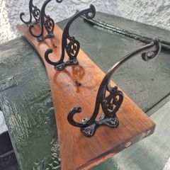 Vintage cast iron 8 hook wall coathanging rail