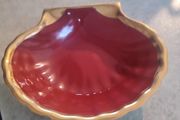 TRINKET  OR SOAP DISH This shell dish is shaped like a shell and handmade. It is made of high fired Burgundy clay in France and it has a long tradition in this manufacture. The clay is covered with a very hard glaze and this makes it resistant to scratche