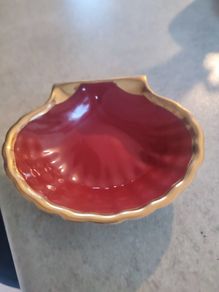 TRINKET  OR SOAP DISH This shell dish is shaped like a shell and handmade. It is made of high fired Burgundy clay in France and it has a long tradition in this manufacture. The clay is covered with a very hard glaze and this makes it resistant to scratche