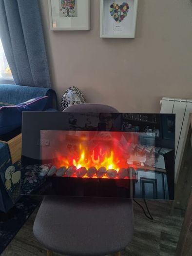 Electric fire. Aspen wall mounted electric fire Now Reduced to thirty euro