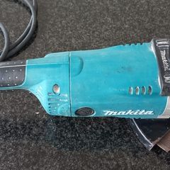 Makita GA9020S  corded angle grinder,  complete with a diamond blade.