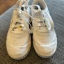 Unisex UK 12 white Puma trainers Image 3