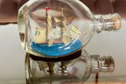 Miniature Antique Tall Ship in a Triangular Dimpled Bottle