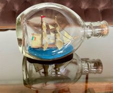 Miniature Antique Tall Ship in a Triangular Dimpled Bottle