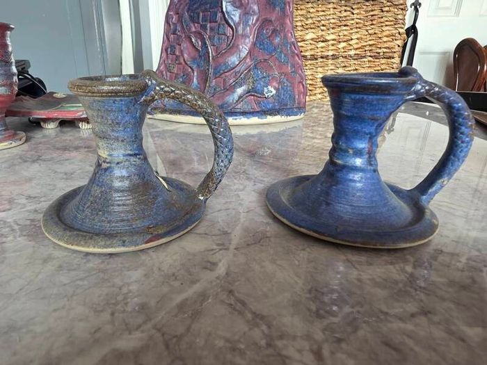 15 pieces of Michael Kennedy pottery. Mixed pieces and sizes. Great condition.