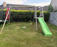 Swing set with slide