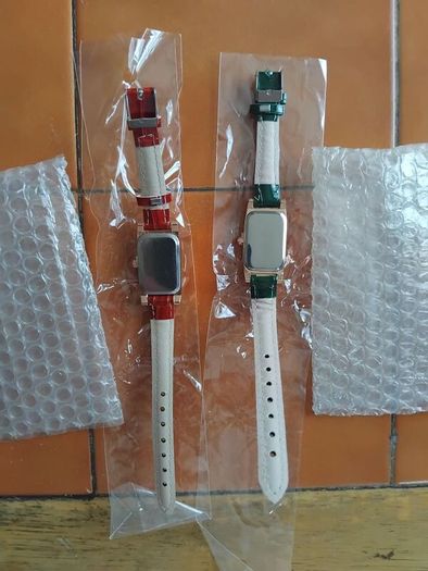 2 womans quartz watches with leather straps
