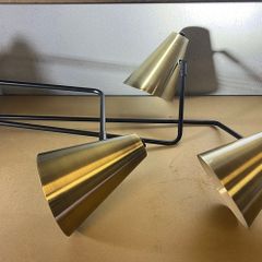 Vintage style multi-arm ceiling light.
