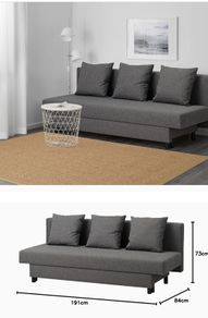 Grey IKEA Asarum sofa bed with 3 cushions