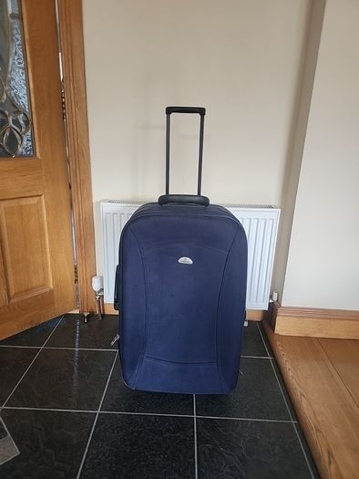 Large navy suitcase