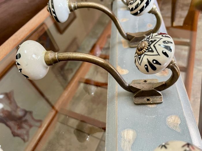 New Unused Stylish Entryway Mounted Ceramic and Brass Coat Hanger