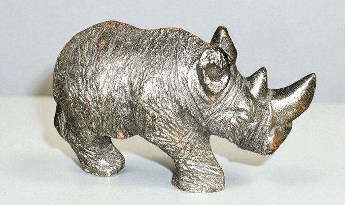 Small heavy rhino figurine