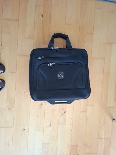 Delsey wheelie suitcase.