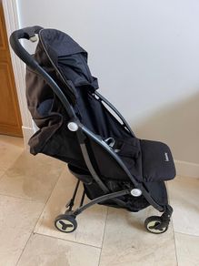 Compact lightweight travel stroller
