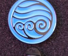 Celtic water symbol , pin back badge.