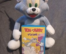 Tom and Jerry vhs tape and plush toy