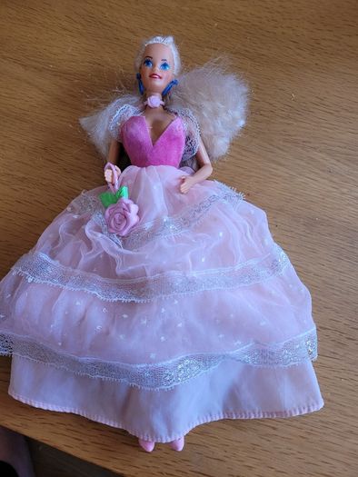 Vintage Barbie with blond hair and princess dress