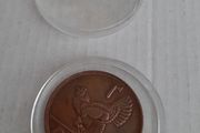 Irish Penny in coin case