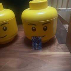 Two LEGO heads for storing LEGO