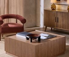 Square wooden coffee table with fluted detailing