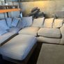 Grey corner sofa with scatter cushions and footstool Image 4