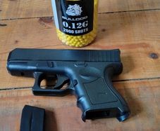Plastic spring loaded bb gun
