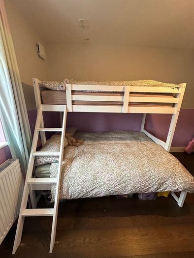 Triple bunk bed.