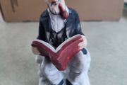 Figurine OF Old Man Sitting On Bench, Smoking His Pipe Reading Book Vintage