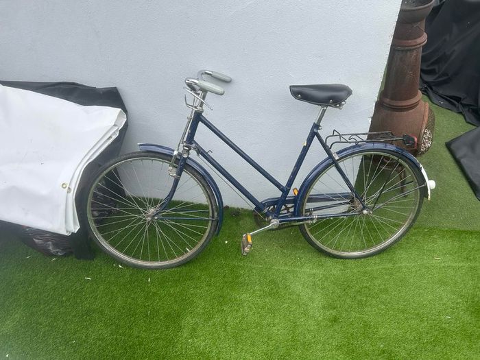 Vintage Raleigh roadster (navy blue, "All-Steel Bicycle")