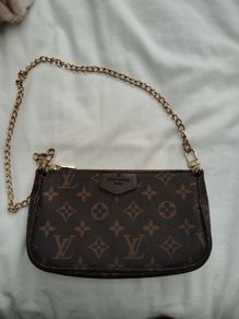 Lovely clutch L V logo