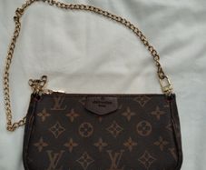 Lovely clutch L V logo
