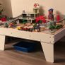 Big train set, the table for it, trains Image 2