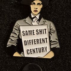 Same shit, different century, pin back badge.