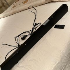 Logik Soundbar and remote