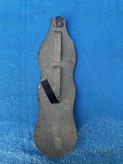 Vintage horse brasses on leather strap