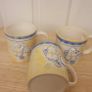 Mugs/Ceramic Mugs (4). .. "Ideal for Shelf Display in a Cafe or Kitchen"  Cream with Yellow and Blue Image 2