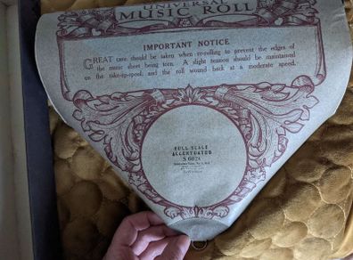 Antique Pianola music roll