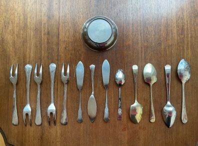 Assorted old cutlery.