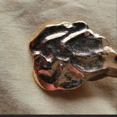 Vintage yves saint laurent gold pin