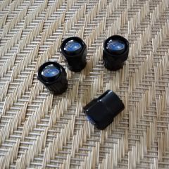Brand New Subaru Black Dust Caps x4