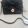 RED V Valentino genuine black leather crossbody bag with large bow and pink interior lining Image 4