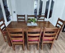 Solid wood table and 8 matching chairs