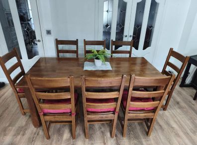 Solid wood table and 8 matching chairs