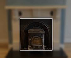 Cast iron arched fireplace insert