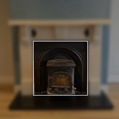 Cast iron arched fireplace insert