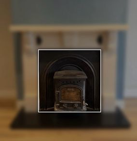 Cast iron arched fireplace insert