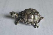 Miniature silver figurine of a turtle