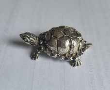 Miniature silver figurine of a turtle